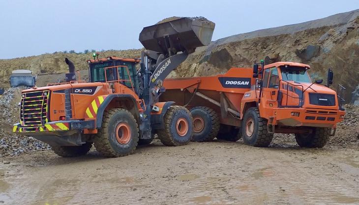 Doosan DL550-5 wheel loader and DA40-5 articulated dumptruck at work at Carnsew Quarry Doosan DL550-5 wheel loader and DA40-5 articulated dumptruck