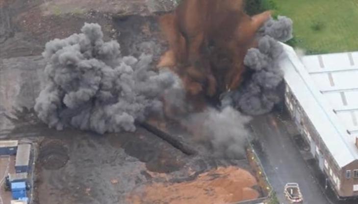 Sand from Tarmac's Hints Quarry was used in the controlled detonation of an unexploded bomb unearthed on a building site in Birmingham (Photo: The Daily Telegraph) Controlled explosion (Photo: The Daily Telegraph)