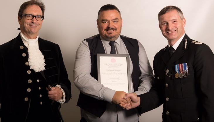 Darren Peace receiving his award Darren Peace