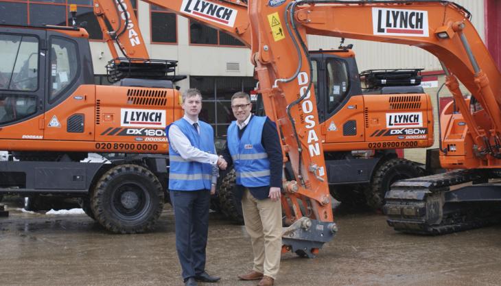 Merrill Lynch (left), operations director at Lynch Plant Hire Ltd, with Justin Scott-Thomas, sales director at Promac Solutions Ltd Doosan wheeled excavators