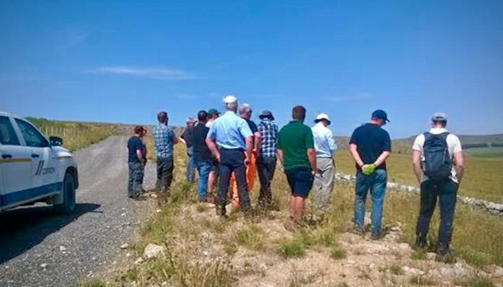 Viewing calcareous grassland restoration work on land adjacent to Dove Holes Quarry. Photo: Debra Royal/NAM Dove Holes quarry
