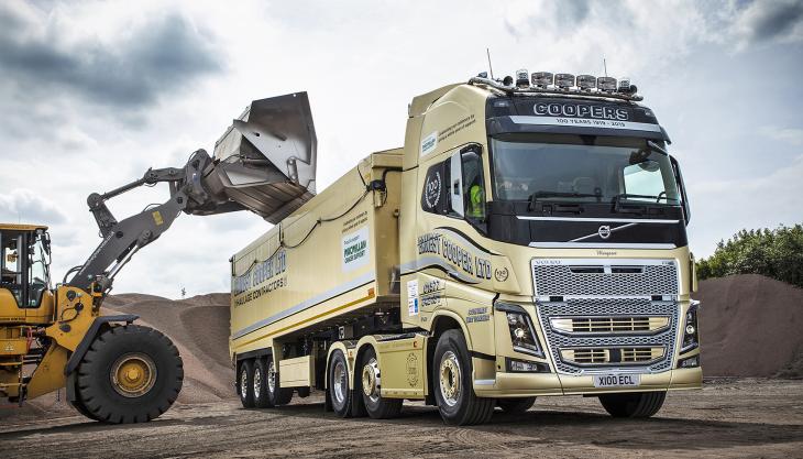 To mark 100 years in business, Ernest Cooper Ltd has invested in a bespoke gold-painted Volvo FH16 750 tractor unit, which will also be used to raise money in partnership with Macmillan Cancer Support Gold Volvo FH16 750 truck