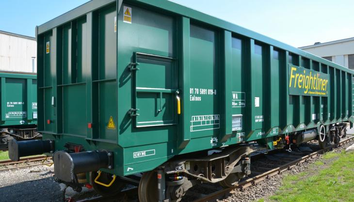 New box wagons from recycled coal hoppers Freightliner box wagons
