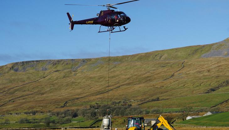 Hanson donate stone for Three Peaks pathway Airlifted stone