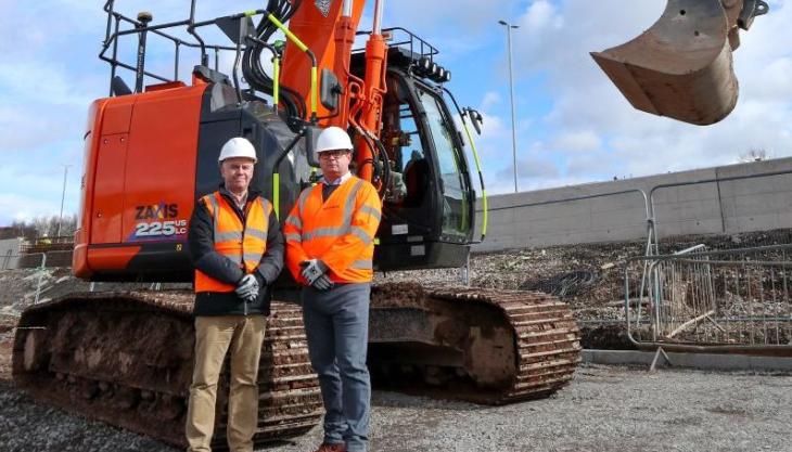 L-R: David Roberts, chief executive officer of HCMUK, with Dave Bennett, managing director of Topcon Positioning GB Hitachi and Topcon