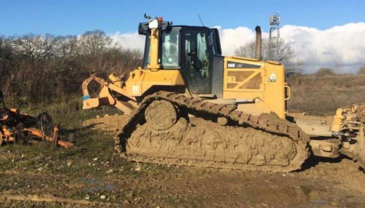 APK Earthmoving were fined £10,000 after a security guard suffered serious injuries to one of his hands Dozer