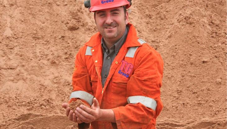 Group aggregates manager Huw Thomas with the ENA-approved sand Huw Thomas