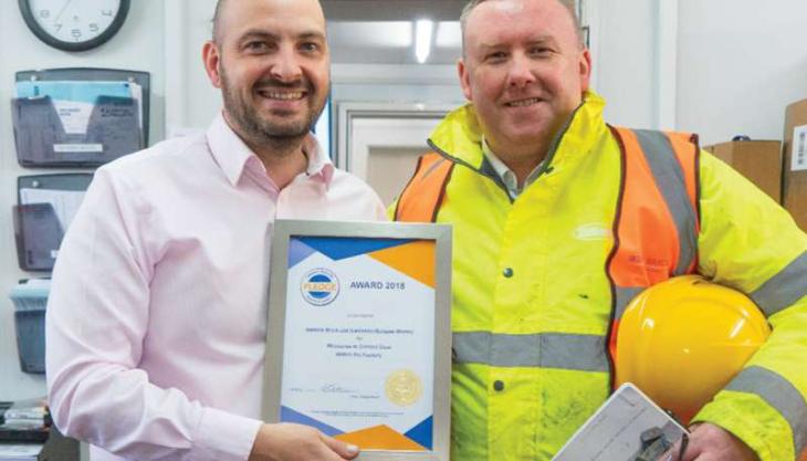 Michael Caughey, senior production manager at Ibstock Eclipse, and Jamie Harris, Tennant national account manager, with the Ceramic Industry Health & Safety Pledge Award Michael Caughey and Jamie Harris