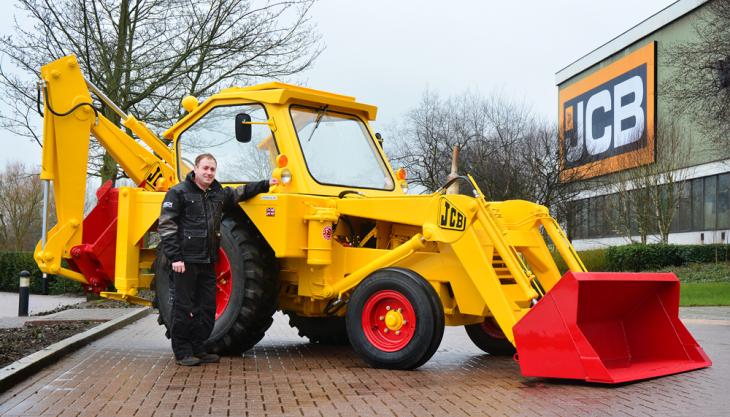 Julian Carder with the restored JCB 3 Restored JCB 3 digger