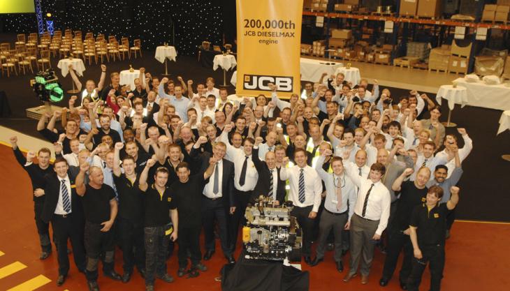 JCB employees celebrate Dieselmax engine production milestone JCB production milestone