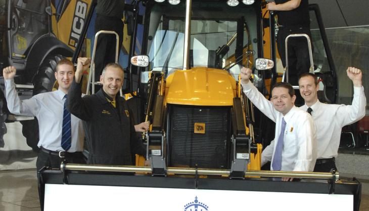 JCB employees celebrate JCB winning Queen's Award for Enterprise JCB win Queen's Award
