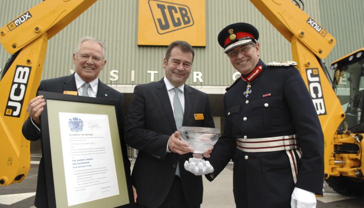 JCB CEO Alan Blake, Steve Carrington, MD of JCB's Backhoe Loader Business Unit and HM Lord-Lieutenant of Staffordshire Ian Dudson, CBE, who presented the Queen's Award JCB receive Queen's Award