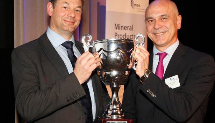 HSE's Colin Mew presenting the John Crabbe Memorial Trophy to Jesus Gonzalez, president of CEMEX UK Winners of the John Crabbe Memorial Trophy