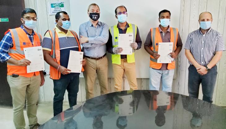 Julian Smallshaw (third from left) with some of the successful candidates Some of the first graduates on IQ Level 3 ILM Certificate