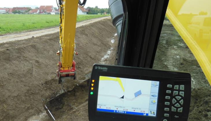 Trimble positioning system fitted to a New Holland E385C excavator