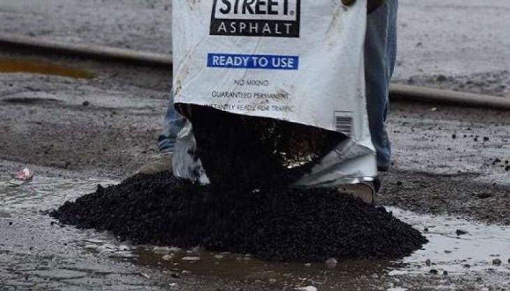 EZ Street offers permanent repair for potholes EZ Street offers permanent repair for potholes