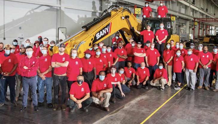 SANY America staff with the 100th SY215C excavator to roll off the production line in Georgia SANY America