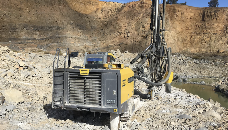 Gravettes et Bâtiments' PowerROC T35 drill rig in operation at Had Soualem Quarry in Morocco Epiroc PowerROC T35 drill rig
