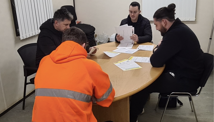 Quarry manager Oliver Thompson and his team at Cerney Wick Quarry Hills safety briefing