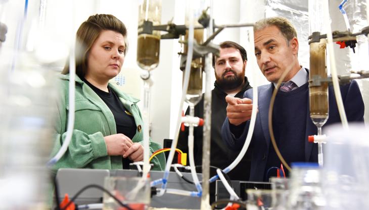 Dr Sina Rezaei Gomari (right) showcasing the facilities at Teesside University to Dr Elizabeth Gilligan, and Sam Clark from Material Evolution Some members of the Mevocrete team