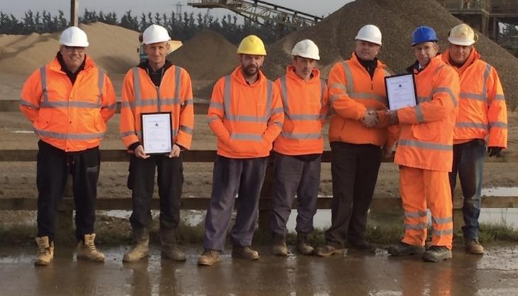 Steve Cole presenting the certificates to some of the Summerleaze team: L-R: Craig Wardrop, Darren Thomas, Wayne Hearn, Steve Huckle, Steve Rackley, Steve Cole and Mike Vanstone Summerleaze