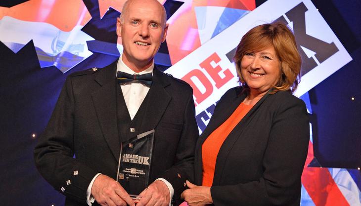 Michael McGowan collecting the award for the UK’s Most Ethical/Sustainable Manufacturer of the Year Michael McGowan