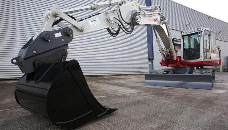 Hill Engineering quick-coupler on a Takeuchi excavator