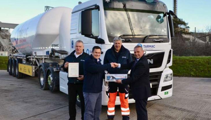 Pictured receiving the award from FTA senior contract manager Eric Higham are Scott Lindsay, distribution manager cement Scotland; George Gowans, transport manager Scotland; and Kenny Smith, sales lorry driver and driver trainer FTA Roadworthiness Award