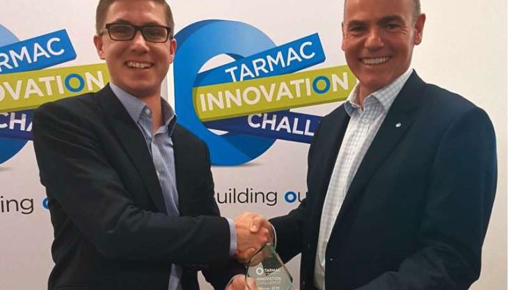Atlantic Pumps’ sales manager, Nathan Rowles (left), receiving the Tarmac Innovation Challenge 2018 award from Tarmac managing director Jeremy Greenwood Tarmac Innovation Challenge