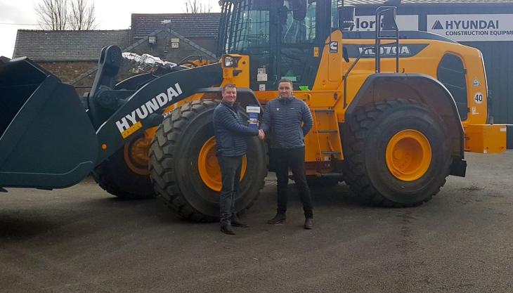 L-R: Taylor & Braithwaite sales director Ian Burton congratulating Taylor & Braithwaite north-east area sales manager Chris Jordan on becoming Hyundai Construction Equipment European Salesperson of the Year for 2021 Taylor & Braithwaite