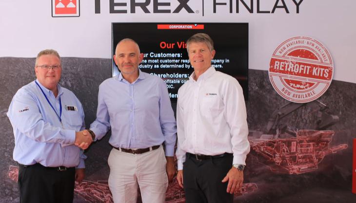 Left to right: Nigel Irvine – Sales Director (Terex Finlay), Robin Powell – MD Molson Group, John Garrison – President & CEO Terex Corporation Molson acquire Finlay Group