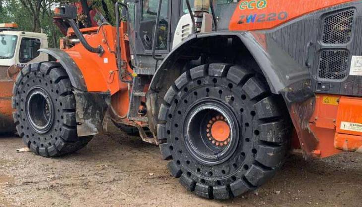A new set of TY cushion solid tyres was recently pre-pressed on to service exchange wheels and fitted to this Hitachi ZW220 loading shovel TY tyre exchange