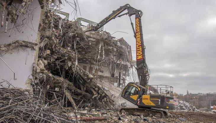Goody Demolition dismantle derelict three-storey office building using high-reach EC300E excavator Volvo high-reach excavator