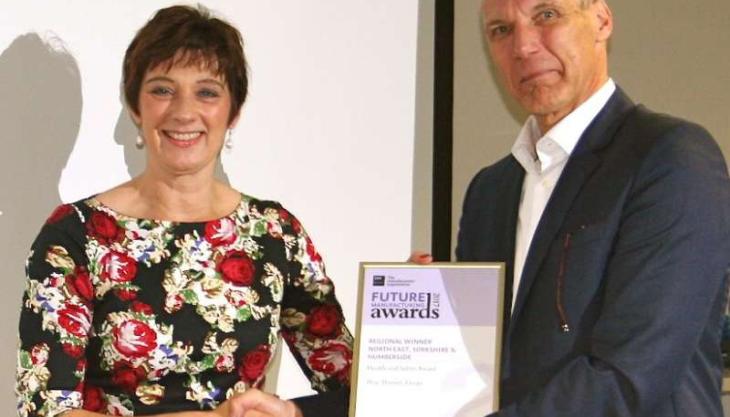 Weir Minerals’ Todmorden director, J.P. Van Leeuwen, receives the award from June Smith, EEF’s external affairs manager Weir Minerals EEF Award