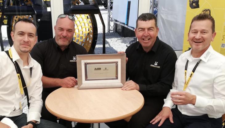 Worsley Plant receiving the plaque from MB at Hillhead 2022 Worsley and MB