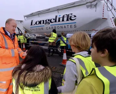 Longcliffe managing director Paul Boustead talking to students about road safety