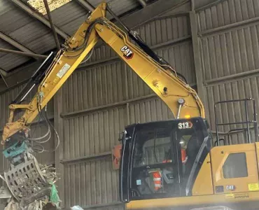 One of the Cat 313 excavators operating for L&S Waste Management