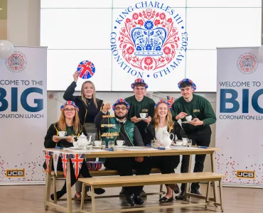 Gearing up for the JCB Big Coronation Lunch are Ella Taylor, Libby Hodge, Qazi Mustafa, Jimmy Hopkinson, Rebecca Brooks and Sean Tucker