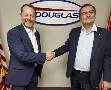 L-R: Paul Ross, president of Douglas Manufacturing, with Fabio Ghisalberti, executive vice-president of Rulmeca 