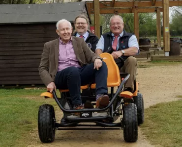 L-R: Paul Hazel and Matthew Millett from Cotswold Lakes Trust with Peter Andrew from The Hills Group in a go-kart at Cotswold Country Park & Beach in the Cotswold Water Park