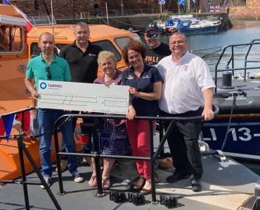 Tarmac’s Dunbar cement plant donated £1,688 towards the cost of Dunbar RNLI’s annual Lifeboat Fete, which helps the charity raise money to continue its work to save lives at sea