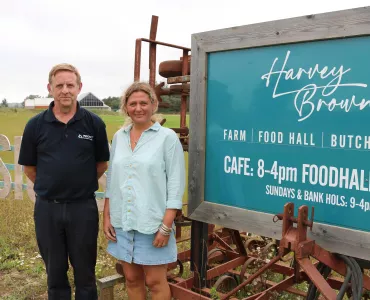 Jemma Brown (right) and Steve Burton with the restored field behind them