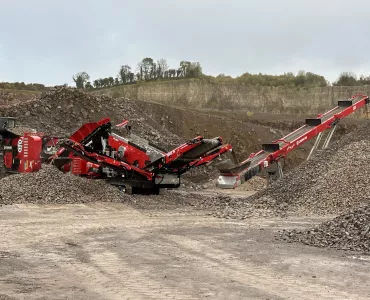 A Screencore XJ jaw crusher , Trident 124 scalper and 380DD stacker conveyor production train
