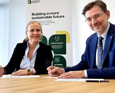 Dr Nicola Kimm, chief sustainability officer and member of the managing board of Heidelberg Materials, and Martin Harper, chief executive officer of BirdLife international, signing the memorandum of understanding