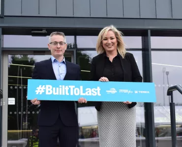 Sean Loughran, Powerscreen business line director and general manager of Terex Dungannon, with First Minister Michelle O’Neill MLA at the official ribbon-cutting ceremony of Powerscreen’s new headquarters 