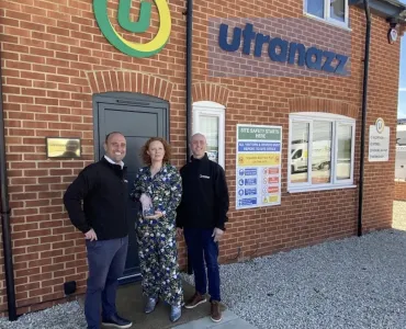 Daniel Wiseman, sales director, and commercial director Will Harris receiving the Innovation Award from Clare Howcutt-Kelly, editor of Concrete Connect