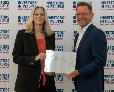 Tina Greenhill, business improvement director at Jet Plant, collects the prestigious Investors in People Award 