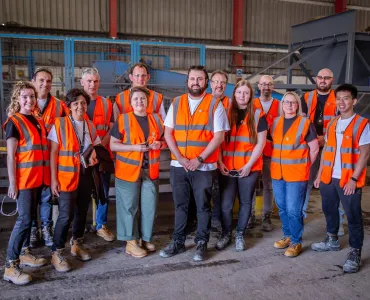 Liz Gilligan and Sam Clark (centre) with the Material Evolution team