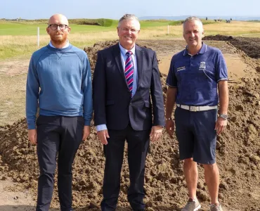 L-R: Club manager Alex Shaw with Scott Bros directors Bob Borthwick and Peter Scott following a delivery of the firm’s sustainably produced sand
