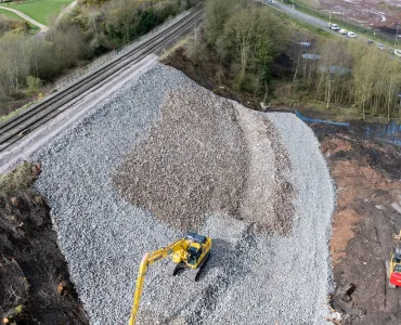Aggregate Industries supplied 20,000 tonnes of stone from Bardon Hill Quarry to restore the Telford embankment. Image: Network Rail